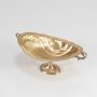 Hammered finish gold fruit bowl with pedestal base and twin handles shown on a plain white background surface.