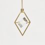 Pendant light with golden diamond frame and crystal centerpiece glowing ceiling lamp on white background.