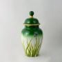 Green and white ceramic jar with golden rim and butterfly design perfect for luxury home and tabletop decor