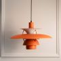 Louis Poulsen PH5 Inspired Pendant Light Orange Light Off White Background