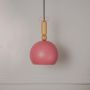 Terracotta dome pendant light with wooden accent displayed off on white background for modern home interiors.
