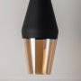 Closeup of pendant light featuring matte black top and golden glass shade stylish decorative ceiling lamp for modern home lighting.
