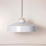 Modern white metal pendant light with wide dome shade and wooden accent displayed off on white background for decor.