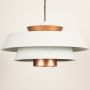 White and copper pendant ceiling light displayed on white background with lights off emphasizing elegant modern metal craftsmanship.