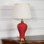 wine red ceramic table lamp light off white background