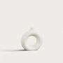 Round hollow ceramic donut vase in white glaze decorative table vase for flowers and home styling minimal modern decor.
