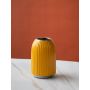 A yellow ribbed decorative vase shown on a plain white background presenting a clean simple and modern product display for catalog use.