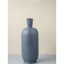 Elegant grey ceramic vase with narrow neck and speckled finish perfect for table decor and living room styling.