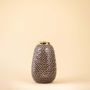 Grey ceramic vase with zigzag embossed surface and metallic gold rim displayed on plain white background.