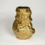 Large gold metal decorative floor vase with hammered texture for modern home decor and corner styling.