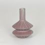 Pink decorative ceramic flower vase isolated on white background modern sculpted vase for home decor styling.