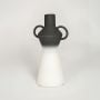 Black and white ombre ceramic vase with dual handle design perfect for modern living room console table or shelf decor styling.