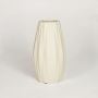 Beige ceramic fluted decorative vase with textured surface ideal for dried flower arrangement on console table shelf and home decor.