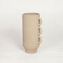 Beige ceramic textured decorative vase with triple side handles ideal for dried flower arrangement and contemporary home decor styling.