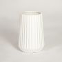 White ceramic decorative vase with vertical ribbed texture perfect for modern living room console table or shelf decor styling.