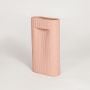 Peach ceramic decorative vase with textured ribbed finish perfect for modern living room console table or shelf decor styling.
