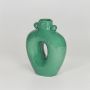 Green decorative ceramic flower vase isolated on white background modern artistic vase for home decor styling.