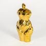 sculpted muse decorative object gold white background 1