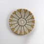 Handcrafted woven wall plate displayed on a clean white background showing its detailed pattern and natural color tones for contemporary decor use.