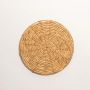 Natural wicker wall decor plate displayed against white background with clear detailing.