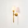elysian brass wall sconce fabric shade light on white background