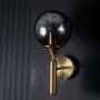 Smoky Grey Round Glass Wall Sconce Light Off Black Background