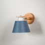 Modern wooden wall sconce with blue lampshade light off white background for bedroom study room and hallway decorative wall lighting.