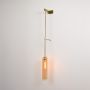 float suspension wall sconce amber light on white background