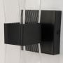 Closeup view of black wall light showing the curved acrylic diffuser and modern sleek detailing.