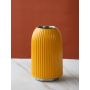 Ribbed yellow ceramic decorative vase displayed on clean white background highlighting textured surface and modern minimalist design.