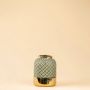 archaic grey green gold ceramic vase small white background