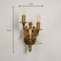 Mermaid cast brass wall sconce