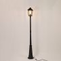 Black outdoor lamppost light with warm glowing lantern shown on a clean white background for classic exterior lighting decor.
