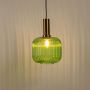 Modern green glass pendant with ribbed glass design and metallic finish displayed on white background.