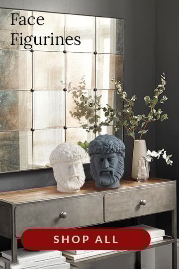 ceramic face figurines